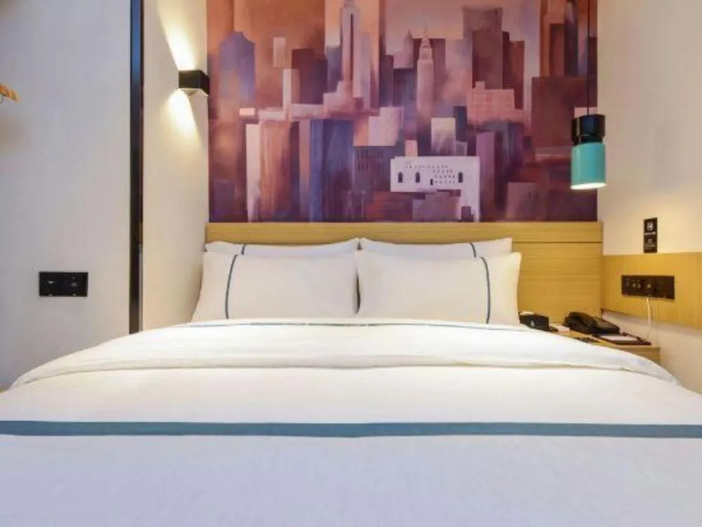 Bed in City Comfort Inn Zunyi Wuchuan