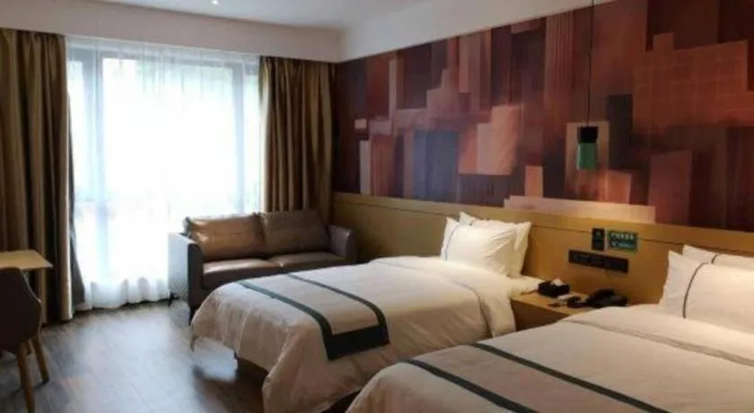 Bed in City Comfort Inn Zunyi Wuchuan