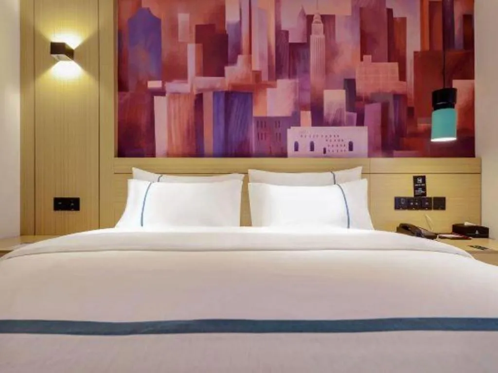 Bed in City Comfort Inn Zunyi Wuchuan