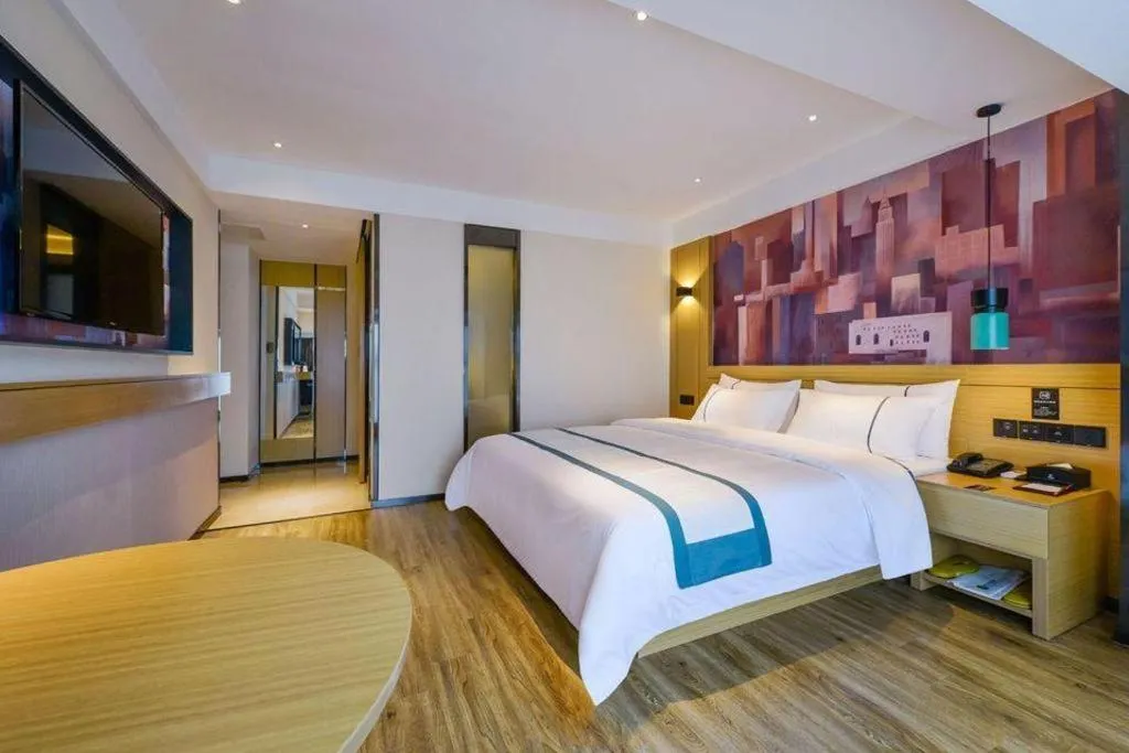 Bed in City Comfort Inn Zunyi Wuchuan