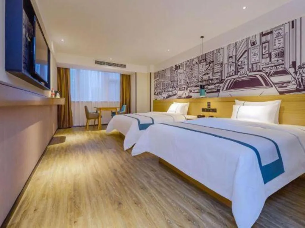 Bed in City Comfort Inn Zunyi Wuchuan