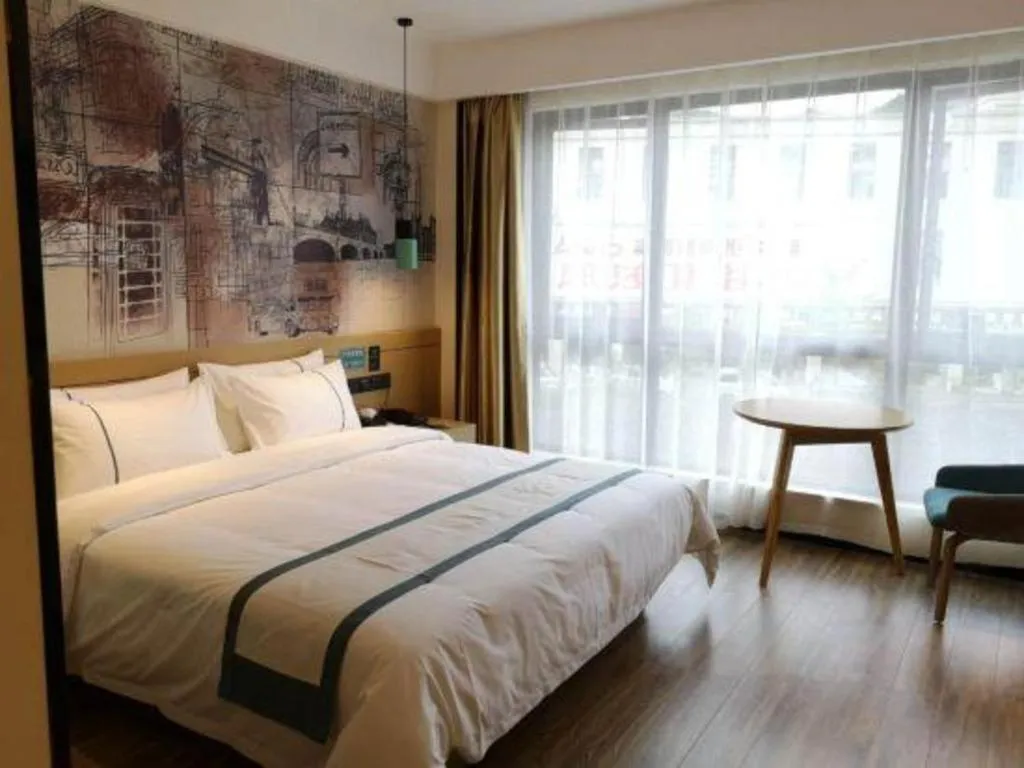 Bed in City Comfort Inn Zunyi Wuchuan