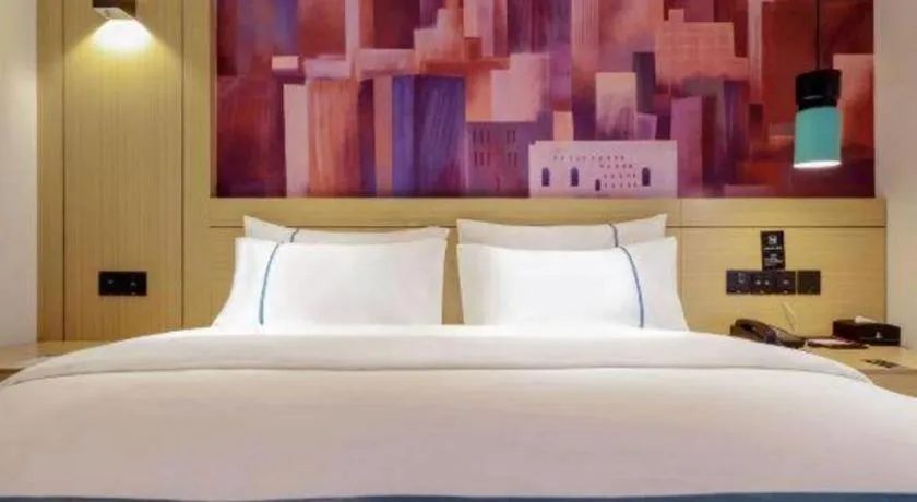 Bed in City Comfort Inn Zunyi Wuchuan