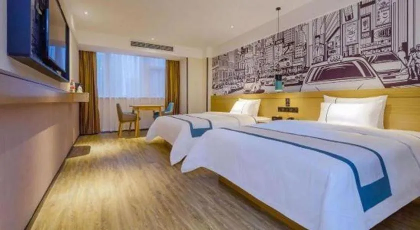 Bed in City Comfort Inn Zunyi Wuchuan
