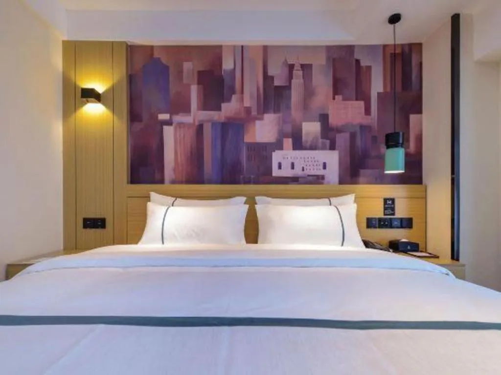 Bed in City Comfort Inn Zunyi Wuchuan