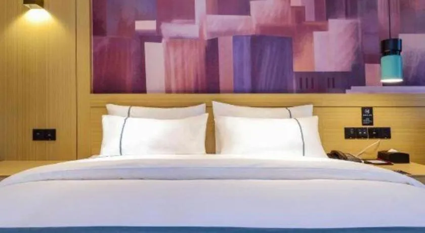 Bed in City Comfort Inn Zunyi Wuchuan