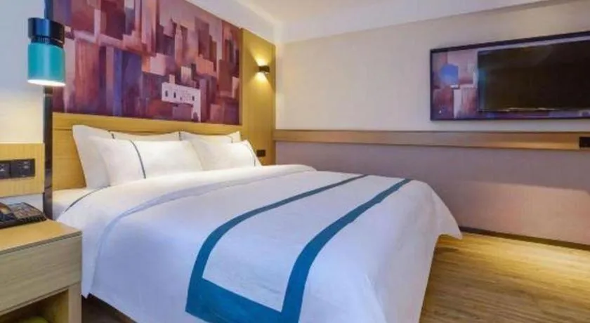 Bed in City Comfort Inn Zunyi Wuchuan