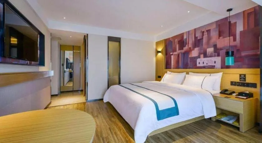 Bed in City Comfort Inn Zunyi Wuchuan