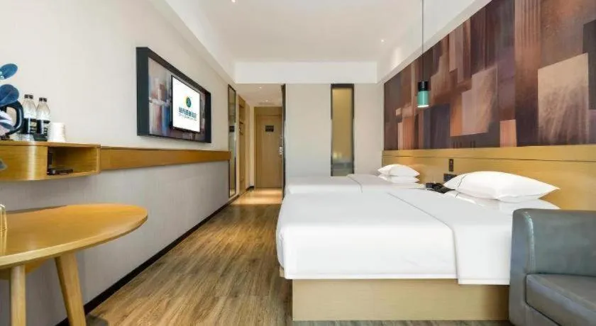 Bed in City Comfort Inn Nanning Kede Zoo Qingchuan Metro Station