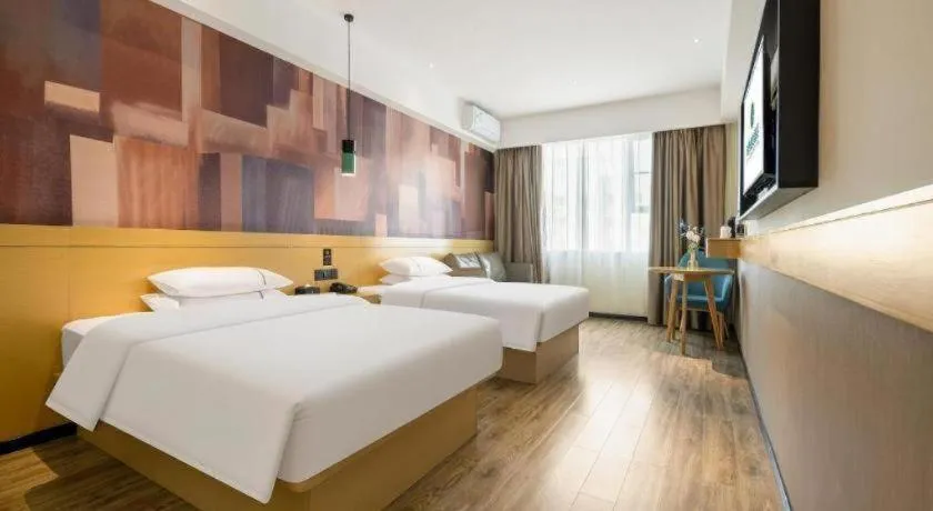 Bed in City Comfort Inn Nanning Kede Zoo Qingchuan Metro Station