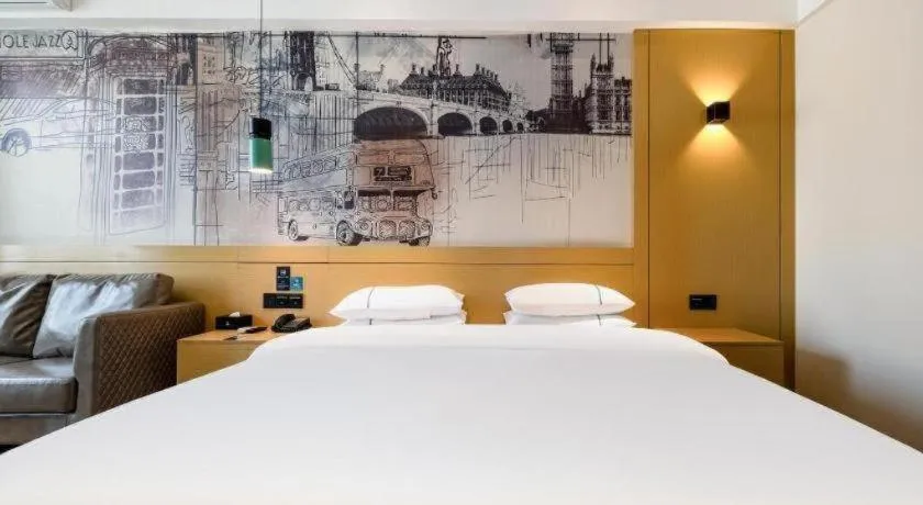 Bed in City Comfort Inn Nanning Kede Zoo Qingchuan Metro Station