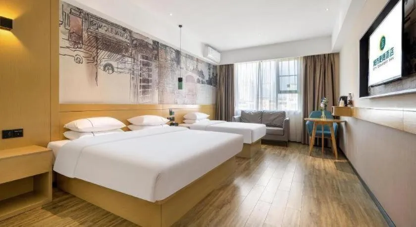 Bed in City Comfort Inn Nanning Kede Zoo Qingchuan Metro Station