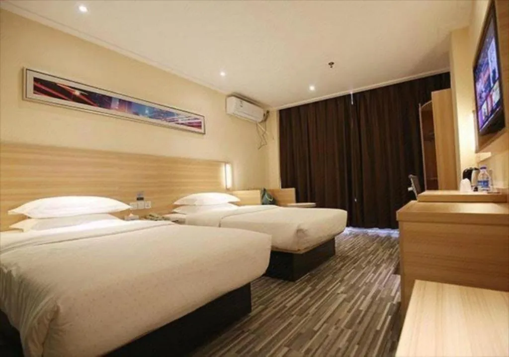 Bed in City Comfort Inn Lichuan Railway Station Tenglong Cave