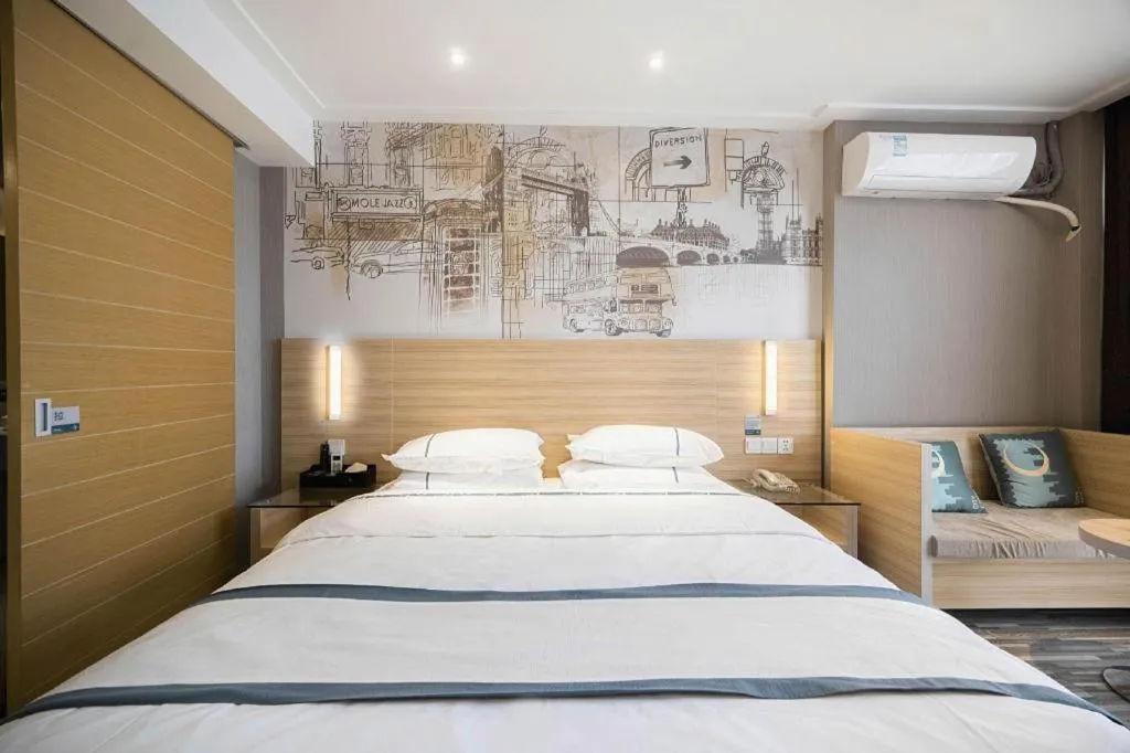 Bed in City Comfort Inn Lichuan Railway Station Tenglong Cave