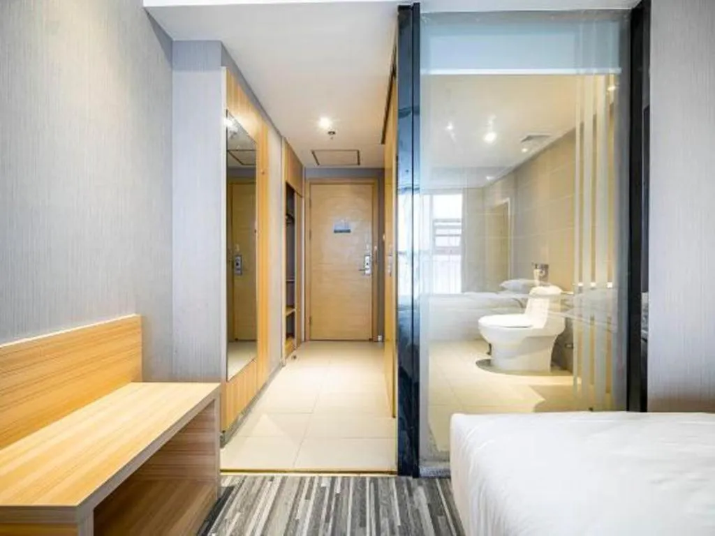 Bed in City Comfort Inn Lichuan Railway Station Tenglong Cave