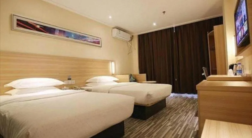 Bed in City Comfort Inn Lichuan Railway Station Tenglong Cave