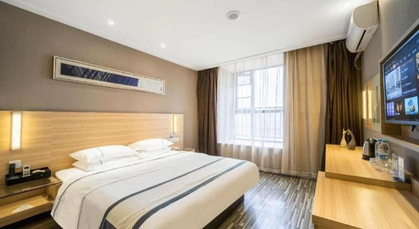 Bed in City Comfort Inn Lichuan Railway Station Tenglong Cave