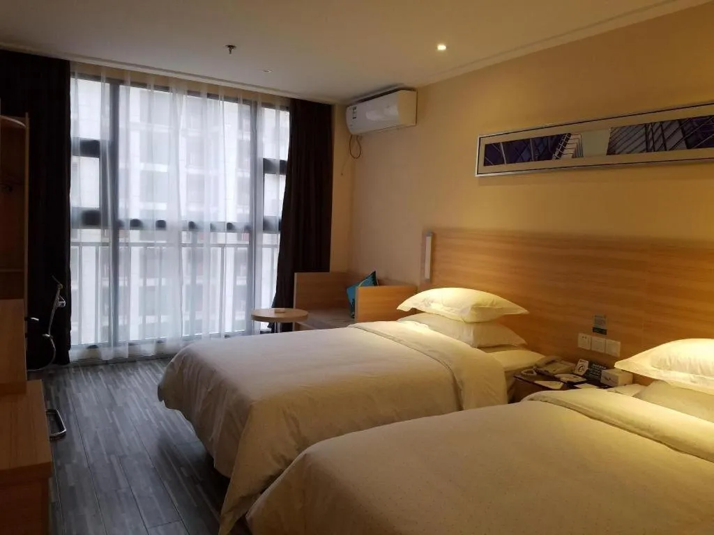 Bed in City Comfort Inn Lichuan Railway Station Tenglong Cave