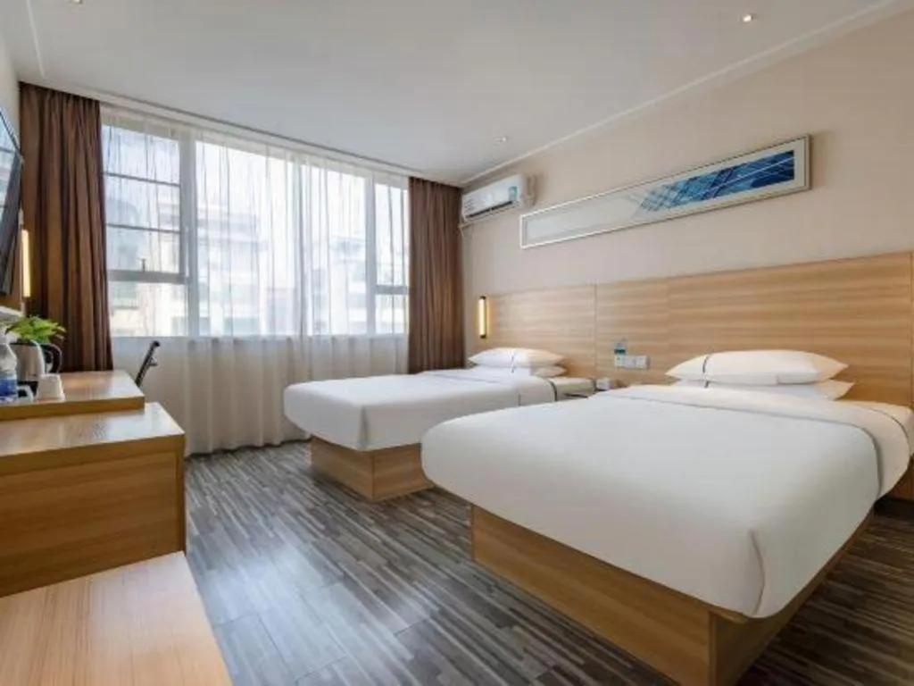 Bed in City Comfort Inn Hezhou High Speed Railway Station