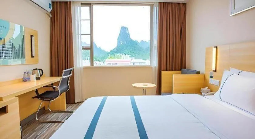 Bed in City Comfort Inn Hezhou High Speed Railway Station