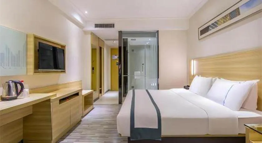 Bed in City Comfort Inn Huanggang Dongmen Road Wanda Plaza