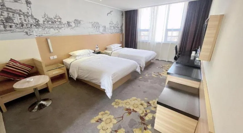 Bed in City Comfort Inn Huanggang Dongmen Road Wanda Plaza