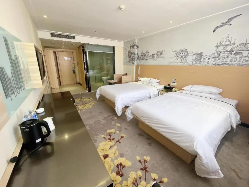 Bed in City Comfort Inn Huanggang Dongmen Road Wanda Plaza