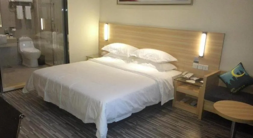 Bed in City Comfort Inn Huanggang Dongmen Road Wanda Plaza