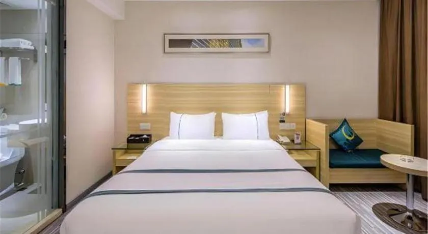 Bed in City Comfort Inn Huanggang Dongmen Road Wanda Plaza