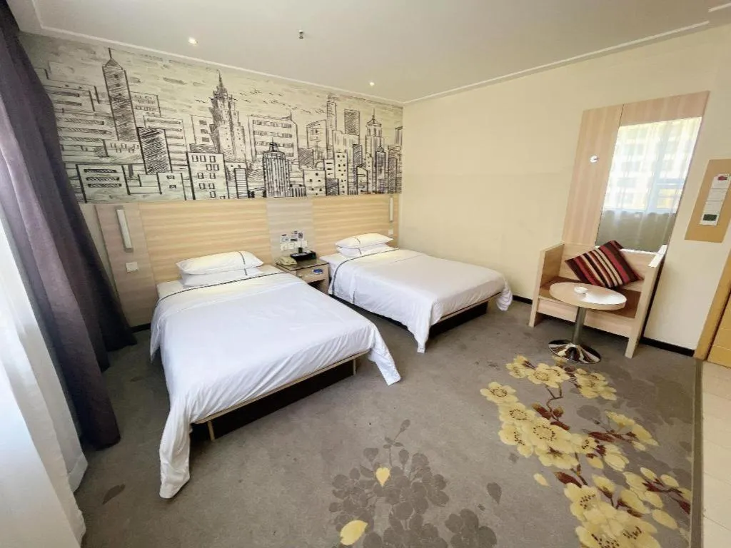 Bed in City Comfort Inn Huanggang Dongmen Road Wanda Plaza