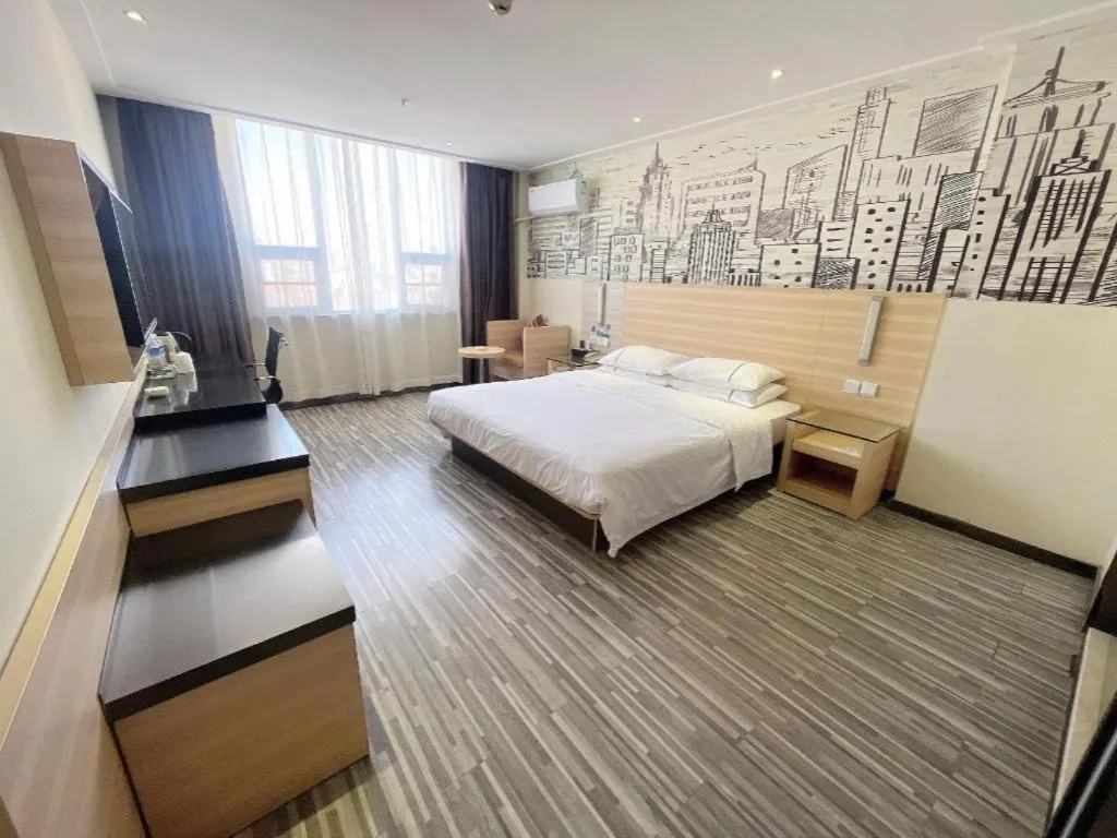 Bed in City Comfort Inn Huanggang Dongmen Road Wanda Plaza