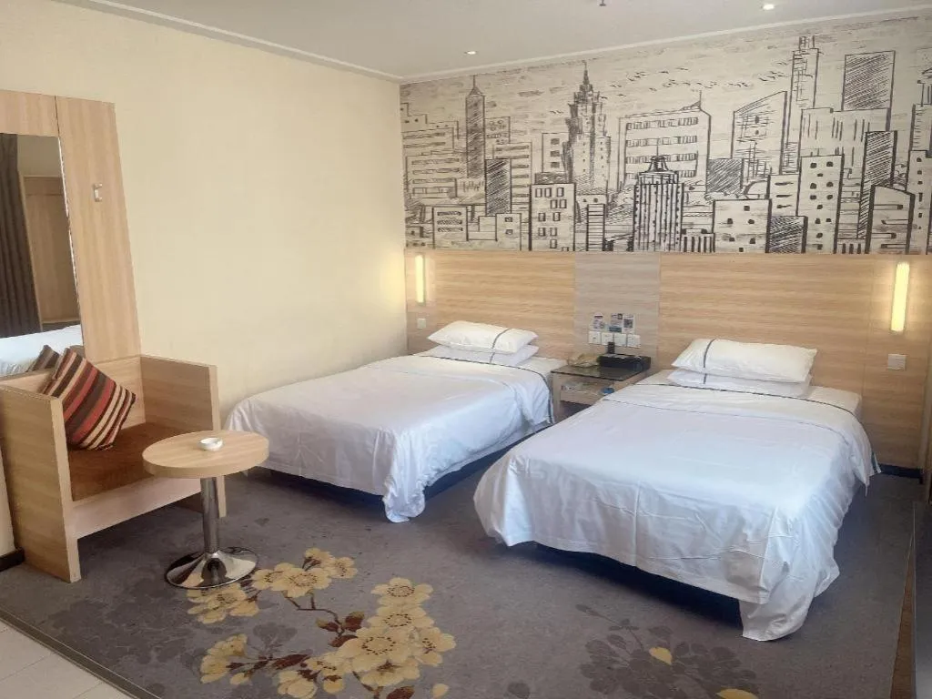 Bed in City Comfort Inn Huanggang Dongmen Road Wanda Plaza