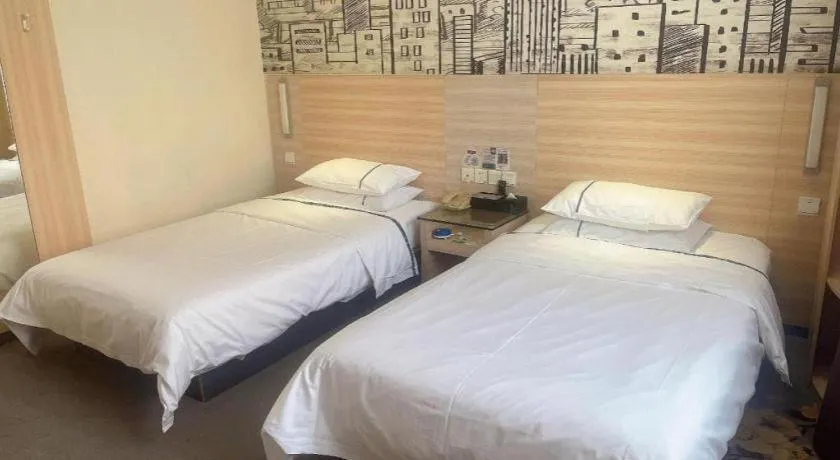 Bed in City Comfort Inn Huanggang Dongmen Road Wanda Plaza