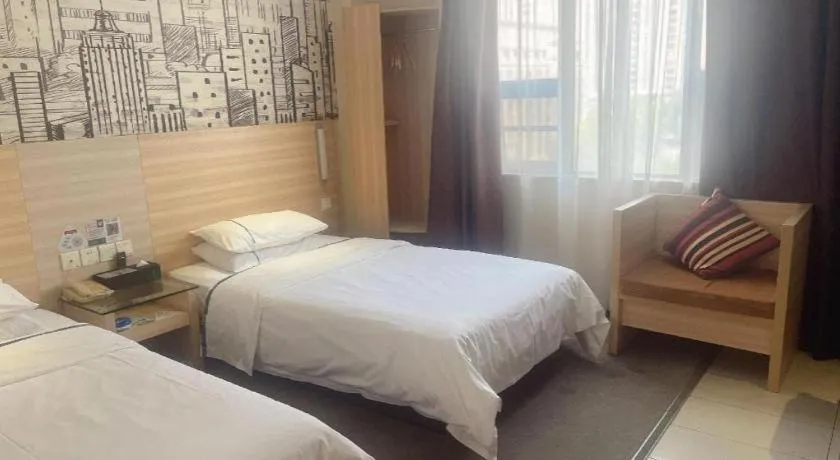 Bed in City Comfort Inn Huanggang Dongmen Road Wanda Plaza