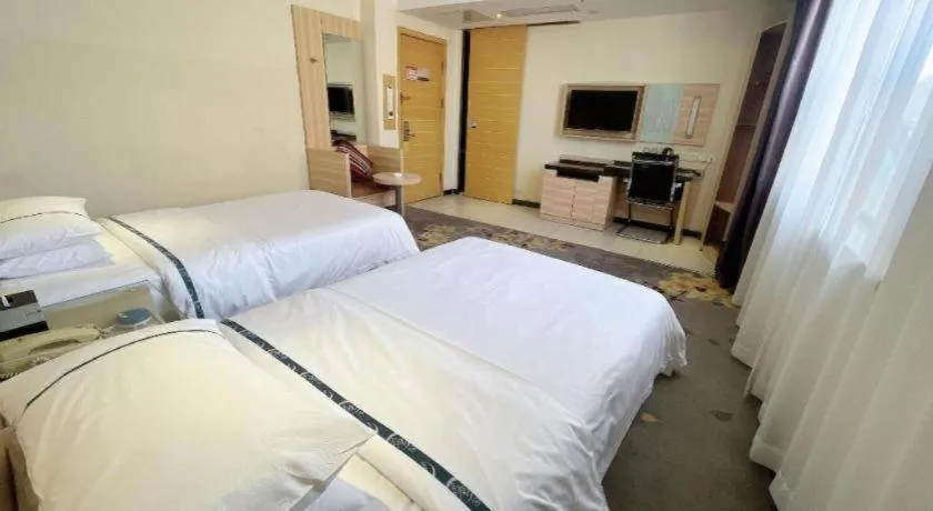 Bed in City Comfort Inn Huanggang Dongmen Road Wanda Plaza