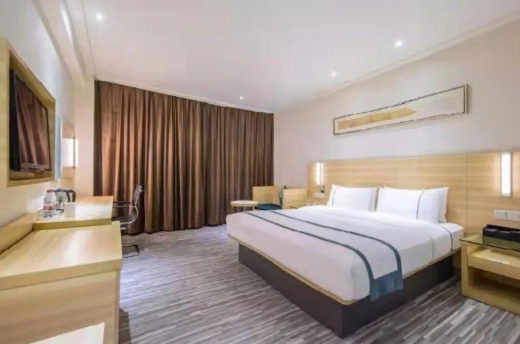 Bed in City Comfort Inn Zhuhai Hengqin Ocean Kingdom Huafa Shangdu