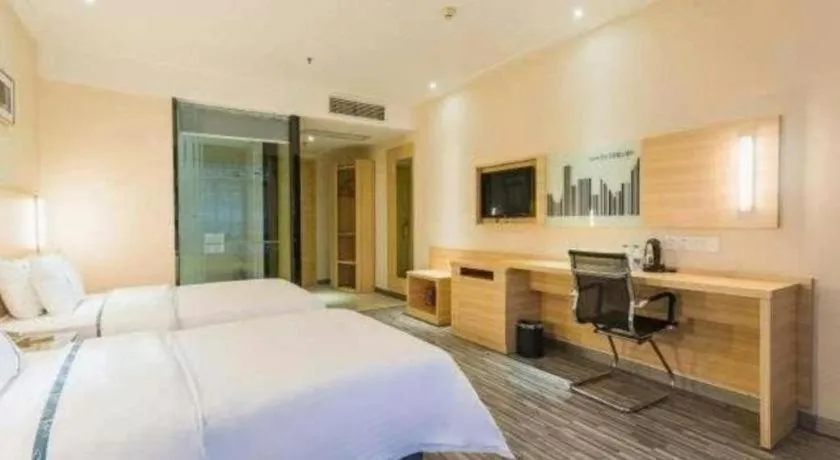 Bed in City Comfort Inn Zhuhai Hengqin Ocean Kingdom Huafa Shangdu