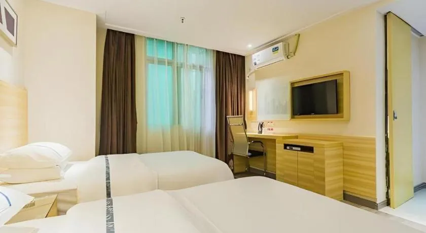 Bed in City Comfort Inn Zhuhai Hengqin Ocean Kingdom Huafa Shangdu