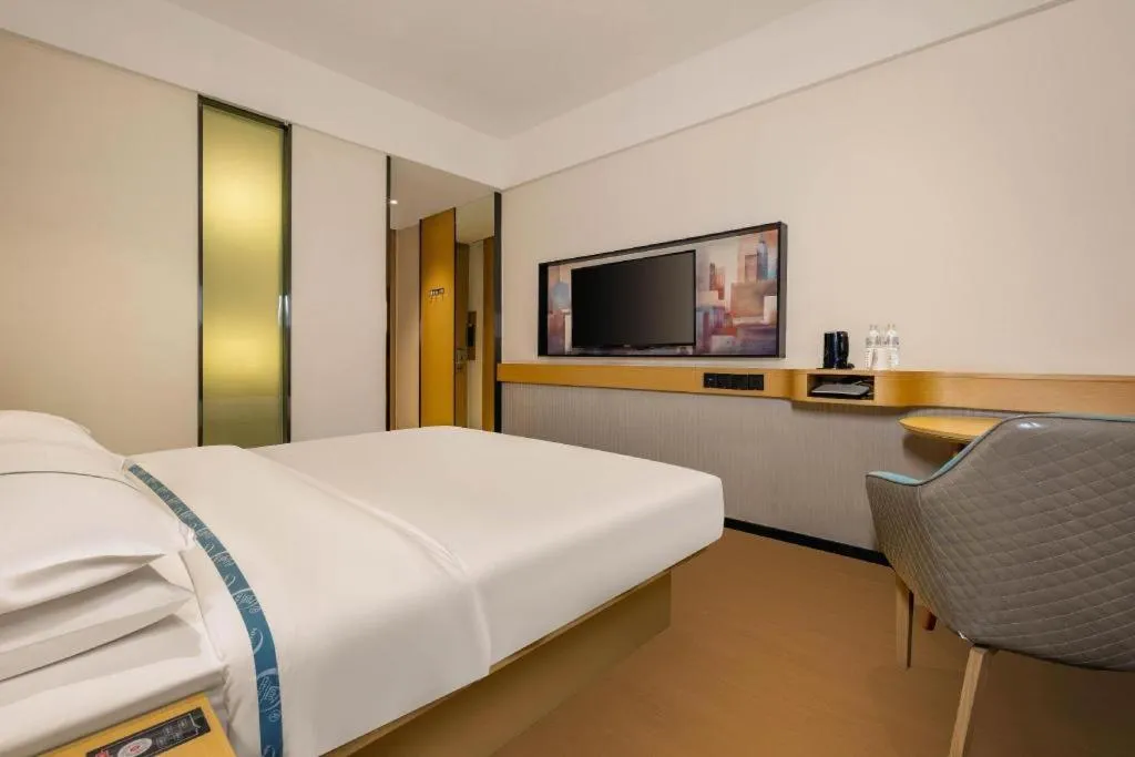 Bed in City Comfort Inn Liuzhou Wuling Liutai Road