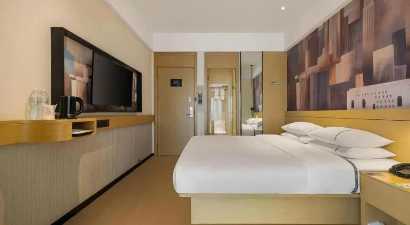 Bed in City Comfort Inn Liuzhou Wuling Liutai Road