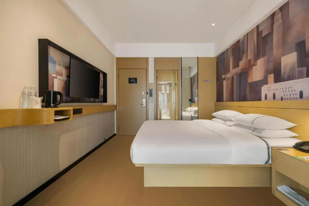 Bed in City Comfort Inn Liuzhou Wuling Liutai Road