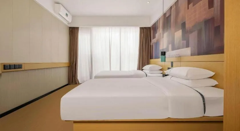 Bed in City Comfort Inn Liuzhou Wuling Liutai Road