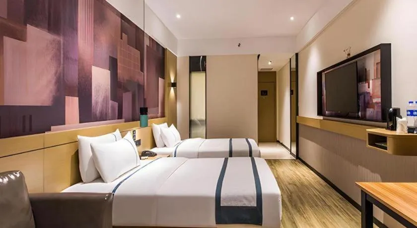 Bed in City Comfort Inn Liuzhou Wuling Liutai Road
