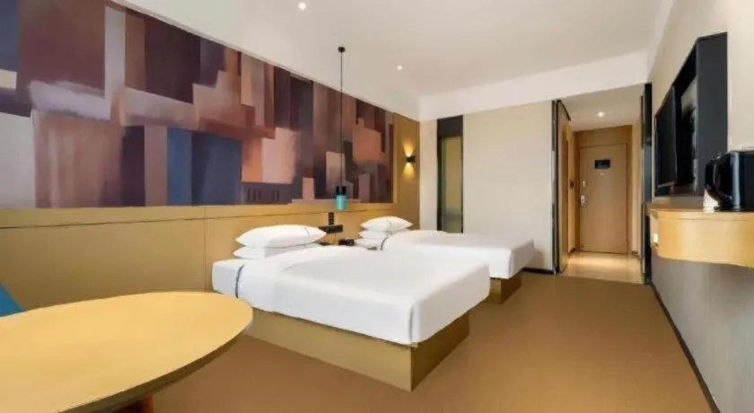 Bed in City Comfort Inn Liuzhou Wuling Liutai Road