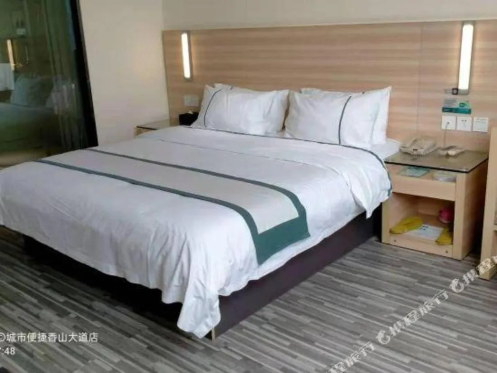 Bed in City Comfort Inn Nanning Wuming Xiangshan Avenue