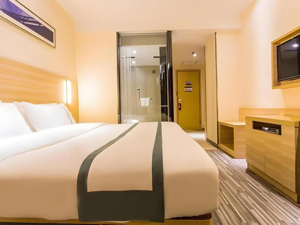 Bed in City Comfort Inn Nanning Wuming Xiangshan Avenue