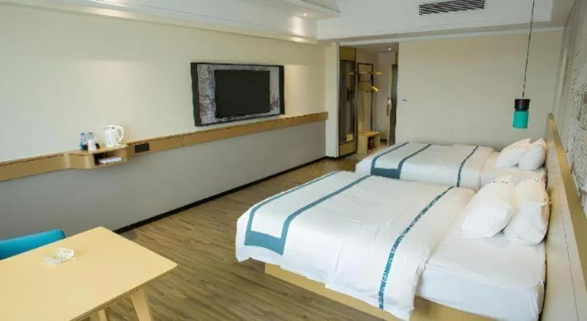 Bed in City Comfort Inn Huizhou Longmen