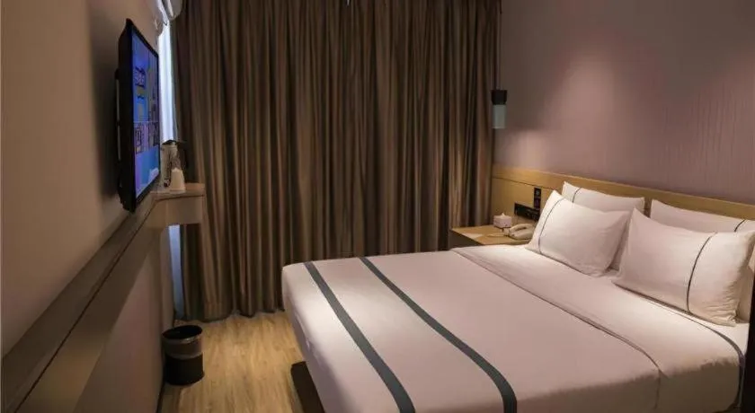 Bed in City Comfort Inn Hainan Tunchang Changsheng Road