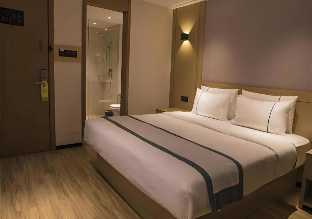 Bed in City Comfort Inn Hainan Tunchang Changsheng Road