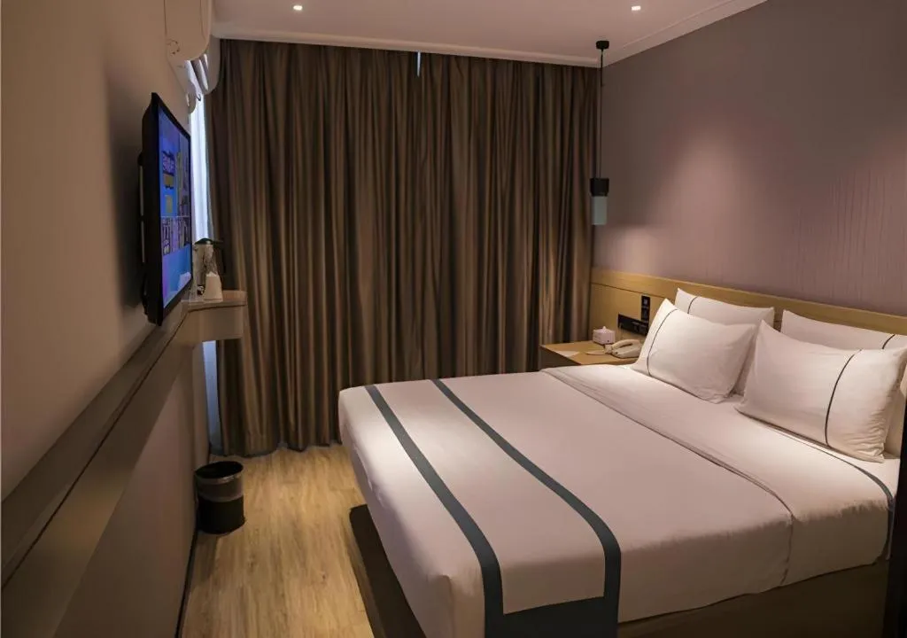 Bed in City Comfort Inn Hainan Tunchang Changsheng Road